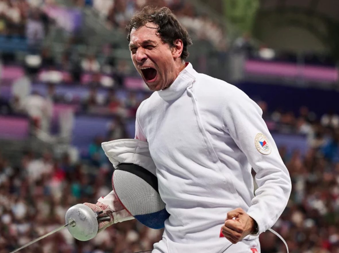 Jiří Beran celebrating a touch in an épée bout